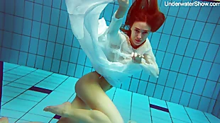 Diana Zelenkina enjoys swimming denuded